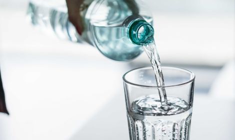 pouring-water-from-pet-bottle-into-a-glass-picjumbo-com.jpg